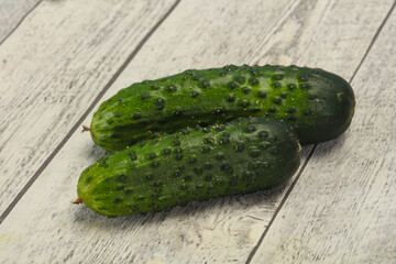 Ripe fresh green two cucumbers
