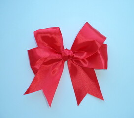 Red bow isolated on white background.