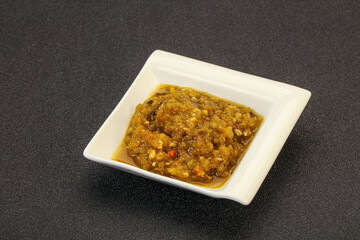 Green spicy sauce in the bowl