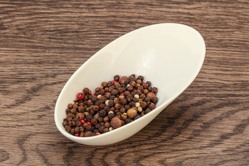 Peppercorn heap in the bowl