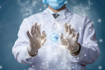 Doctor in a mask on makes manipulations with an atom .