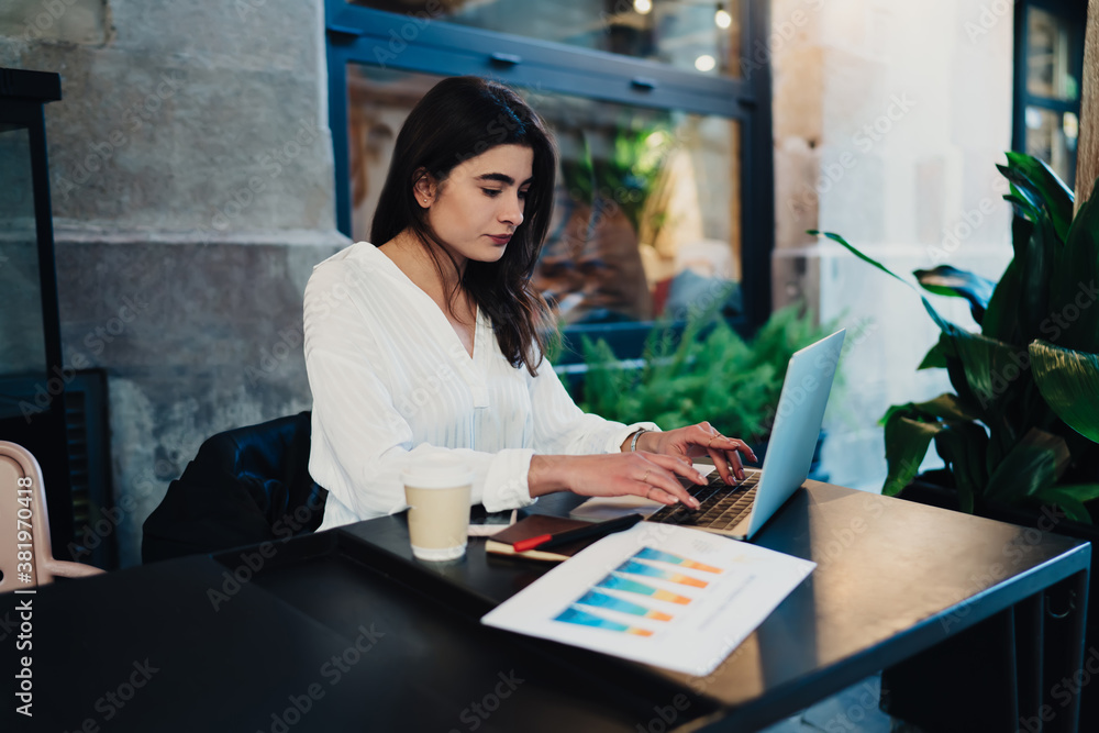 Poster caucasian financial expert working remotely with infographics statistics using laptop computer for e