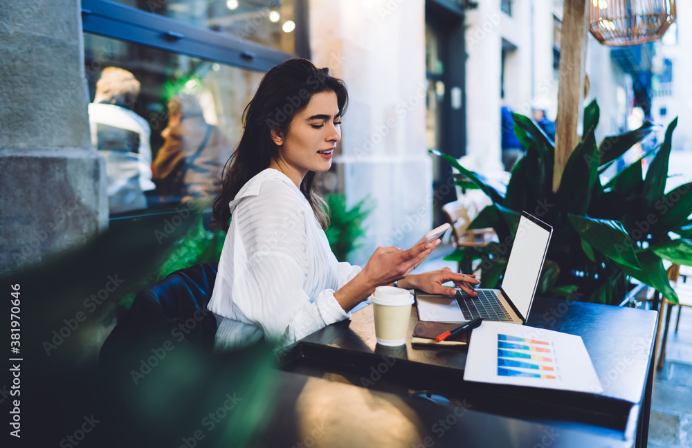Poster caucasian financial expert working remotely with infographics statistics using blank laptop computer