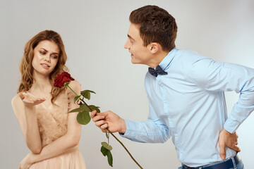 Man and woman with red rose romance love family couple holiday