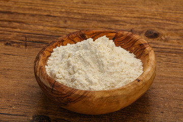 Wheat flour heap in the bowl