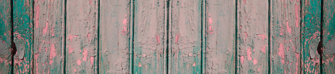 Panorama pink wooden background.