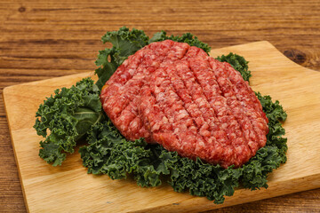 Raw beef burger cutlet for cooking