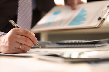 Financial Consultant do Annual Budget Calculation. Man Accountant Calculate Office Staff Wage Using...