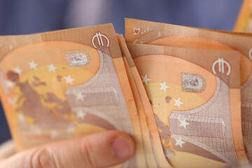 Wealthy Man Counting Euro Savings Finance Concept. Businessman Holding Banknotes in Hand Closeup. Accounting Salary Business Profit. Accountant Manager Earn Currency. Office Worker Pay Bills