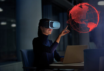 Businesswoman with virtual reality glasses touching virtual globe