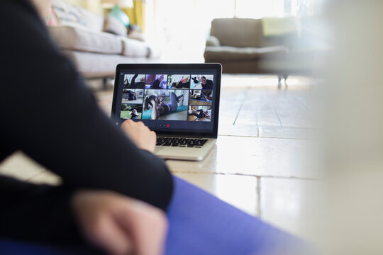 Online exercise class on laptop screen