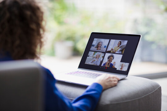 Senior women friends video conferencing on laptop screen