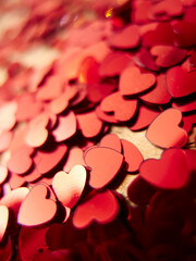 hearts confetti on the golden background