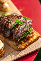 Spanish tapas with roasted beef on toast