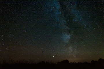 Fototapeta na wymiar Clear night sky with milky way and huge amount of stars.
