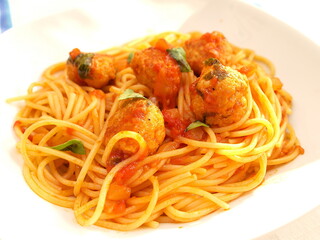 Spaghetti with meatballs in tomato sauce