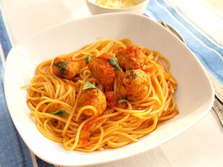Spaghetti with meatballs in tomato sauce