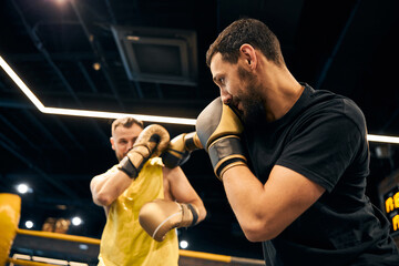 Two athletes having a friendly sparring match