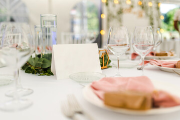 Luxury wedding table decoration in pink and white. Special event table set up. Fresh flower decoration.