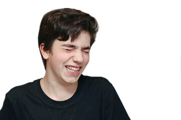 happy teenager boy laughing closeup portrait isolated on white