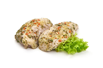 Chicken thighs in garlic sauce with spices, isolated on white background