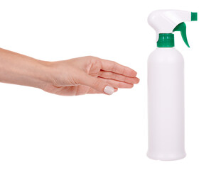 Hand with disinfectant spray in the bottle. Isolated on white background.