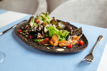 Chicken salad with greens and white sauce