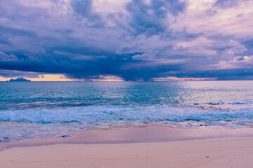 Saint Maarten, Caribbean - January 18 2020:
  Caribbean beach of Saint Maarten island at sunset