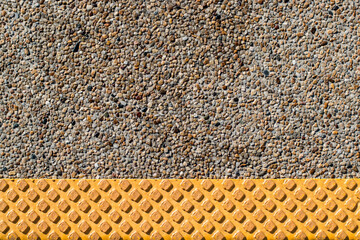 The road floor with yellow stripes