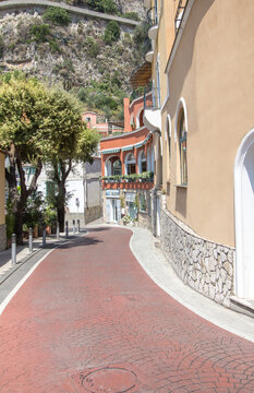 Typical narrow street in city of Positano, Italy