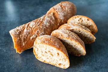  french bread on table. French baguettes with cereal.
