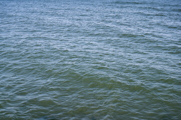 Background Baltic sea with small waves in sunny day, horizontal orientation