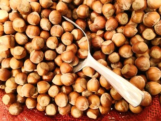 hazelnuts on a wooden background