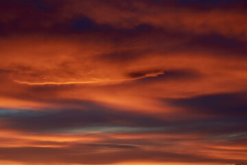 Obraz premium Clouds during sunset, orange