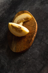 Segment of melon and two slices
