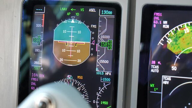 Close Up Airliner Aircraft Cockpit PFD Instruments in Flight.