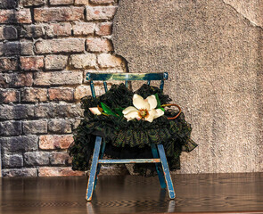 Stone Wall with Chairs and Flowers