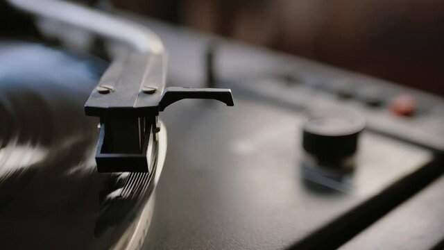 Vinyl record is spinning. Old retro turntable.Turntable stylus on a record