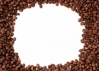 Frame made of coffee beans. Pattern from roasted coffee beans. Template coffee pad.