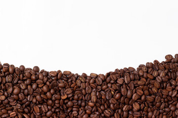 Frame made of coffee beans. Pattern from roasted coffee beans. Template coffee pad.