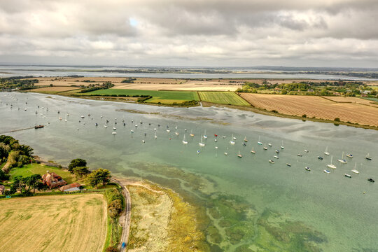 Estuary and yachts surrounded by the beautiful countryside of Southern England.
