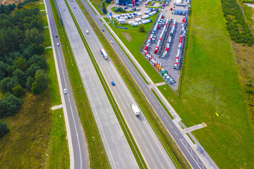 Aerial top view of highway automobile traffic of many cars, transportation concept