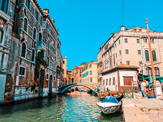 Obraz na płótnie Canvas Venice Orange Teal bridge water cute houses color vivid