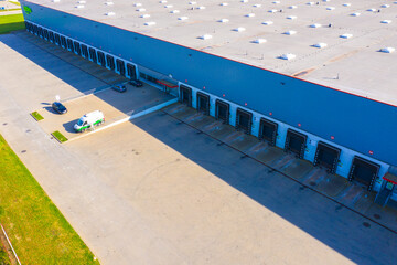 Aerial view of the distribution center, drone photography of the industrial logistic zone.