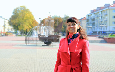 Fototapeta premium Woman walking in the park