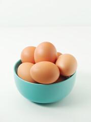 A bowl with chicken eggs