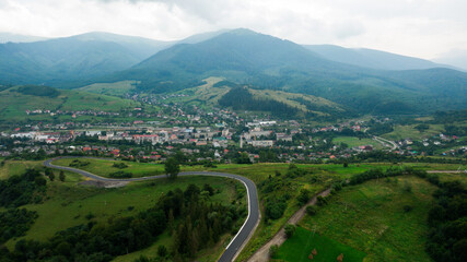 Aerial View of a Highway Road in the Mountain Near the City