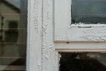 Home Renovation. Home DIY Paint Removal, paint peeling. Fixing windows.