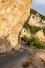 Tunnel in the rocky mountain on the road from Durmitor to Pluzine town near the Lake Piva in Montenegro.