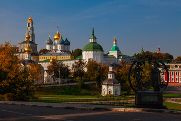 Fototapeta na wymiar View of the Trinity-Sergius Lavra (Sergiev Posad, Russia). In the foreground there is a stele with an inscription in Russian 